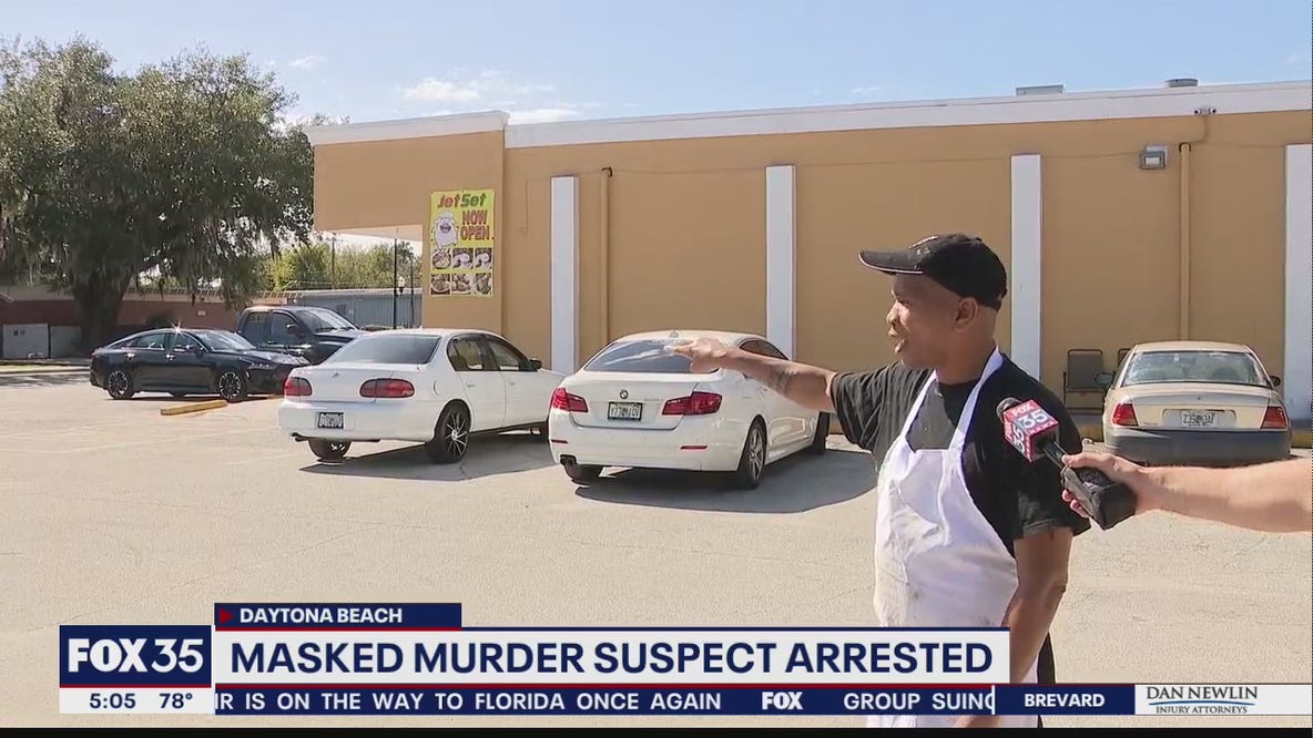 Masked murder suspect arrested